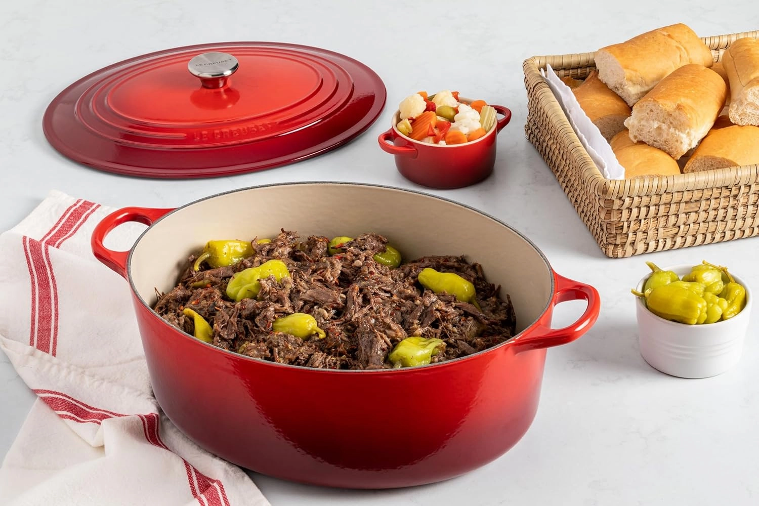 Le Creuset Enameled Cast Iron Signature Oval Dutch Oven, 8 qt., Cerise